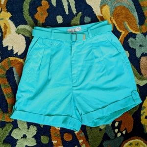 Vintage turquoise pleated shorts with belt and button accents